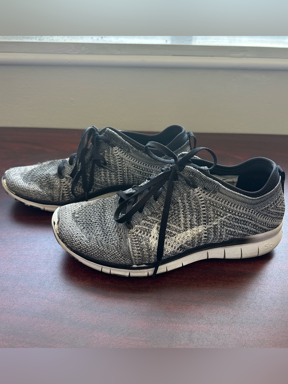 Nike Gray and Black Flyknit Athletic Sneakers